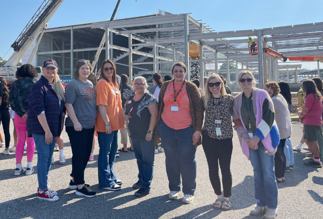  Teachers Attend Topping Ceremony